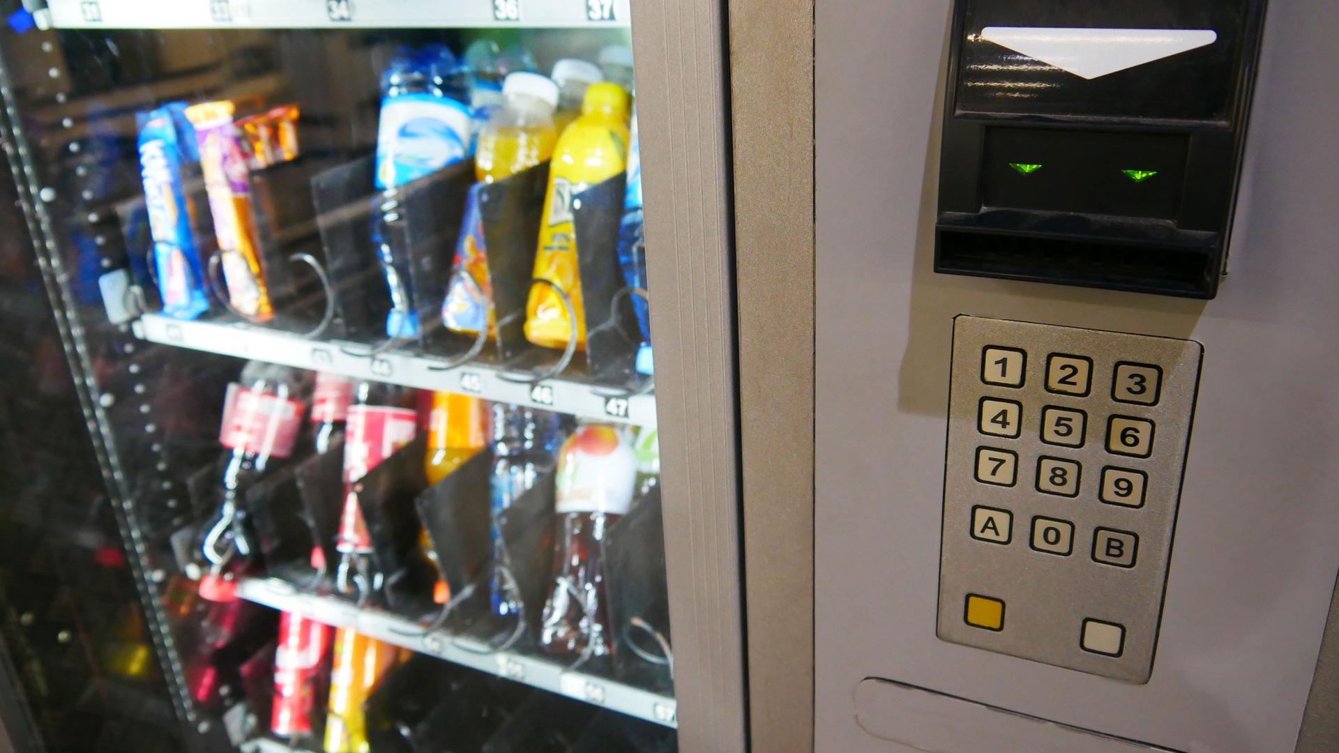 A vending machine selling drinks and sweets